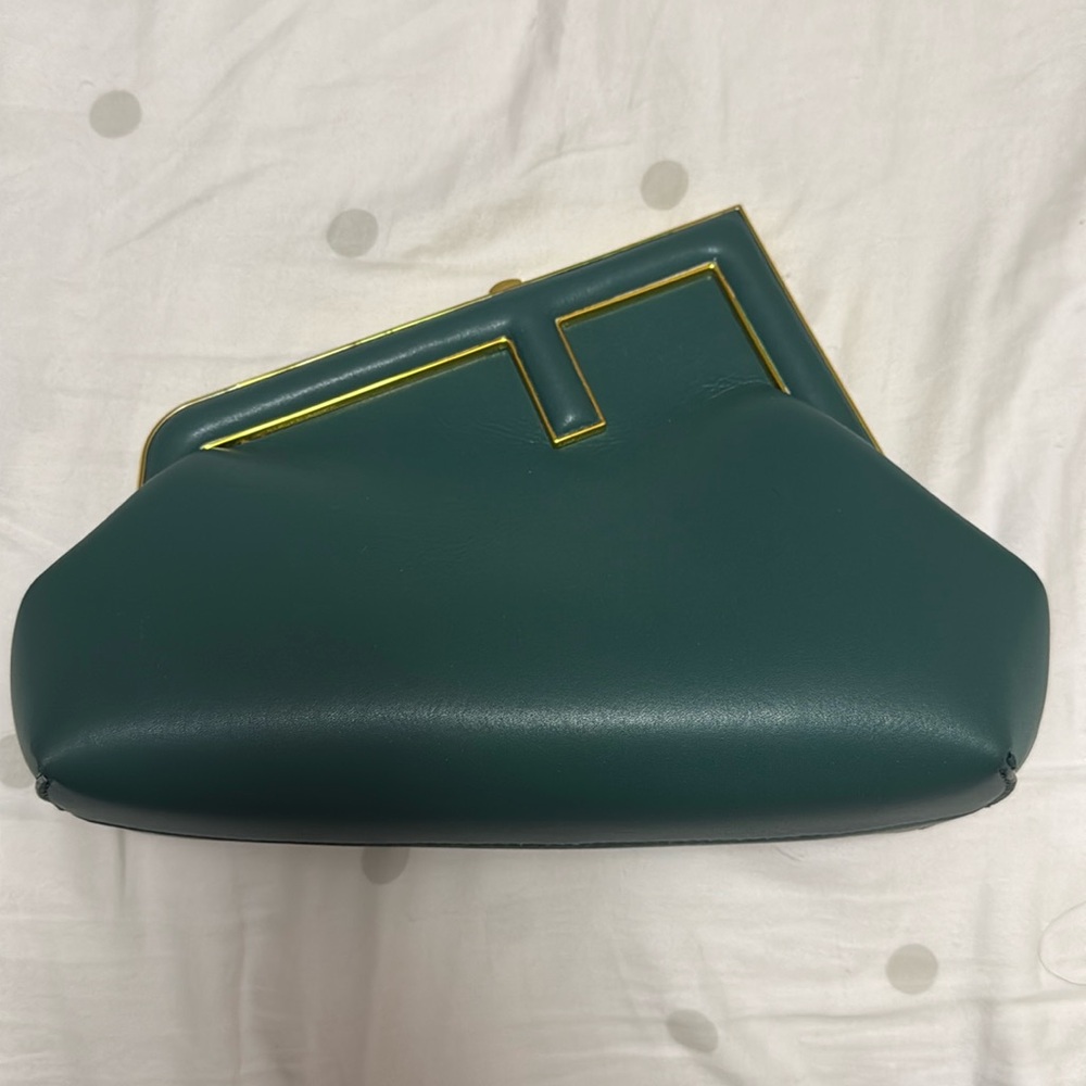 Evening clutch with attachable strap